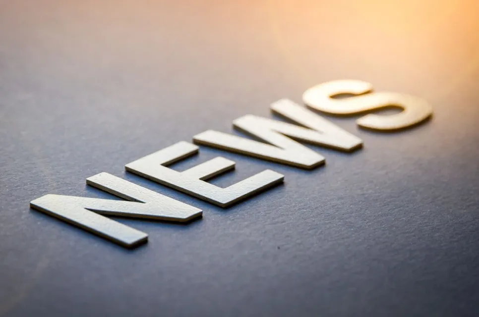 Word news written with white solid letters
