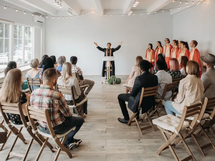 A diverse congregation gathers for a lively