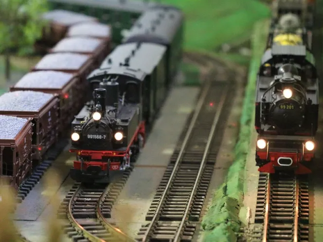 Two model steam locomotives on the layout in the hall at St Peter's