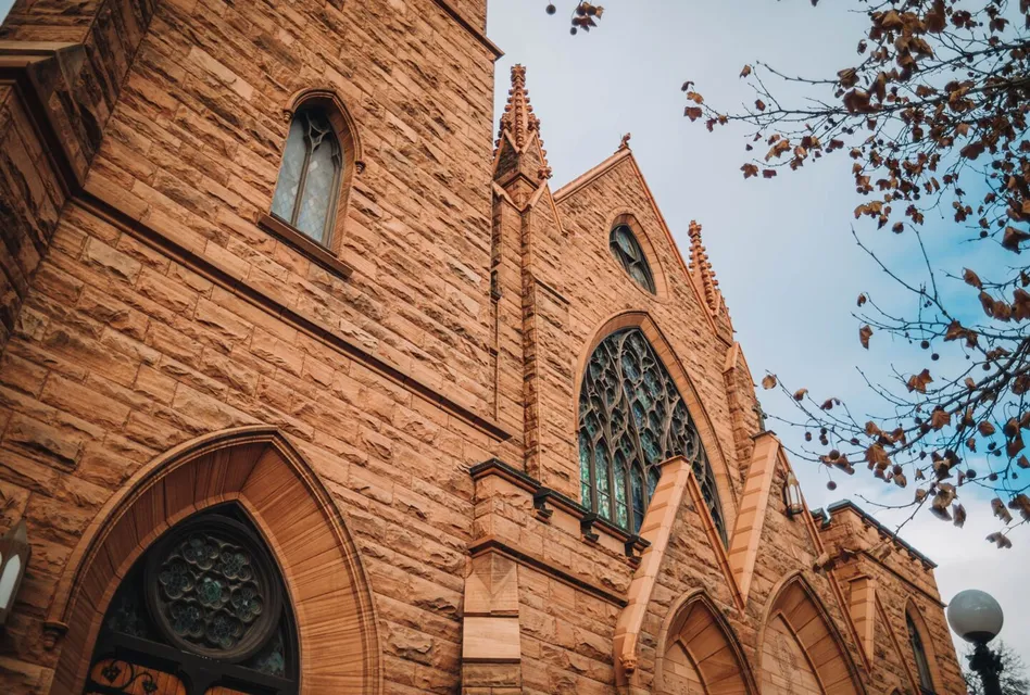 Low angle shot of Gothic Revival church facade