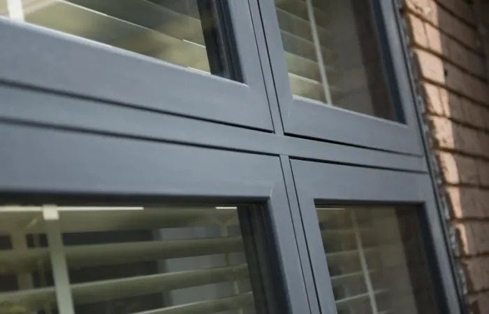 Flush sash window in dark grey