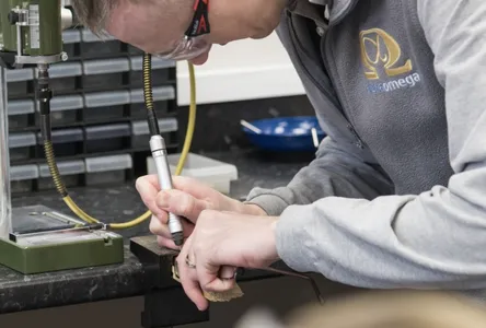 Technician repairing glasses