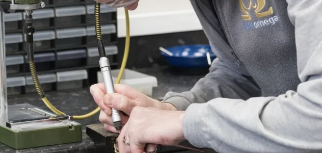 Technician repairing glasses