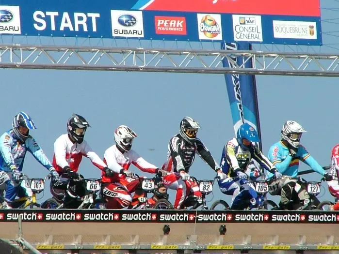 BMX start gate riders line up