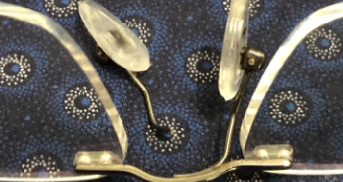 Broken nose pad on glasses