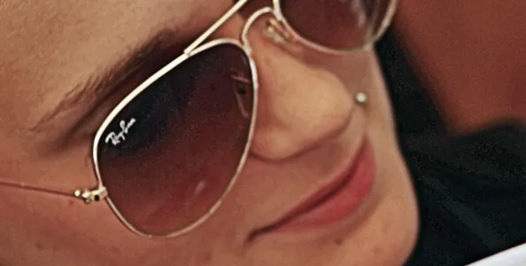 Woman wearing Ray-Ban sunglasses