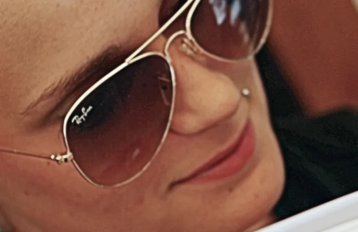 Woman wearing Ray-Ban sunglasses