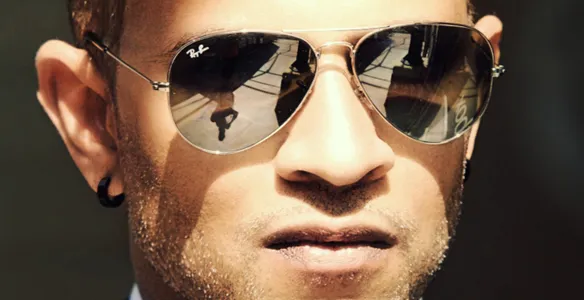 Man wearing Ray-Ban sunglasses