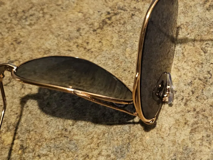 Bent bridge on metal sunglasses