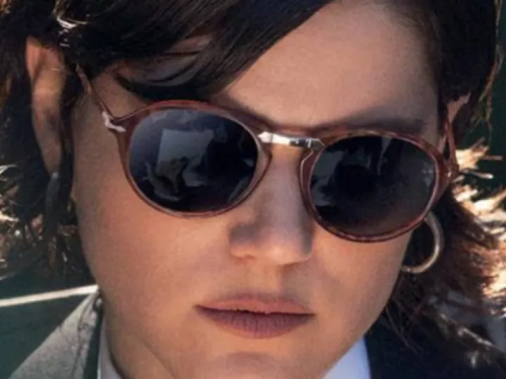 Woman wearing Persol sunglasses