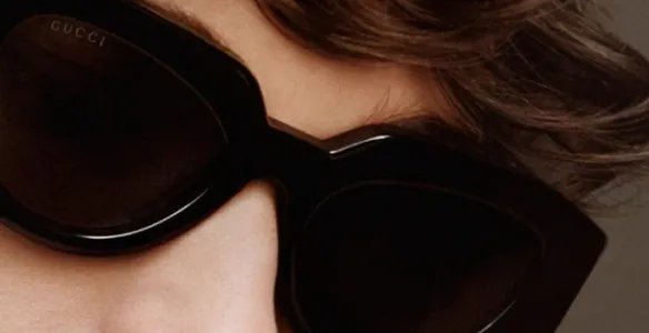 Woman wearing Gucci sunglasses