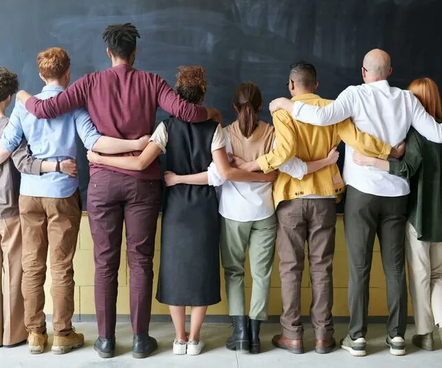 Group of People Standing Indoors
