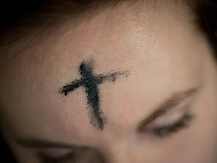 Ash cross forehead