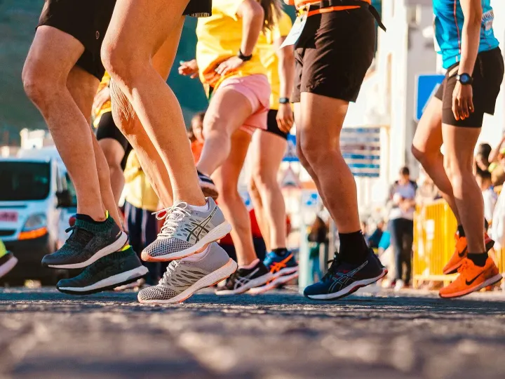 Group of runners participating in a city marathon
