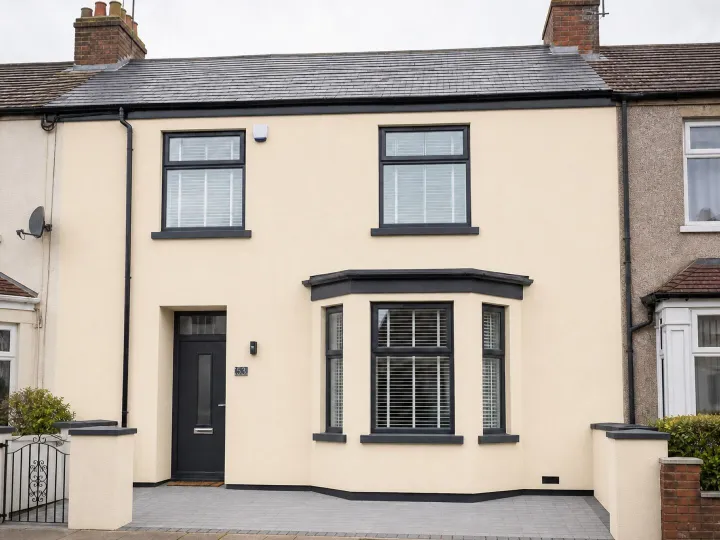 Cream rendered terraced house