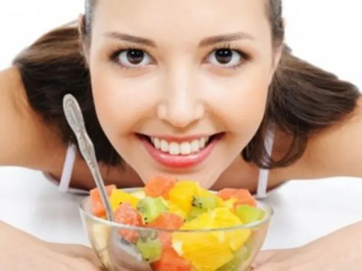 Woman eating fruit 03