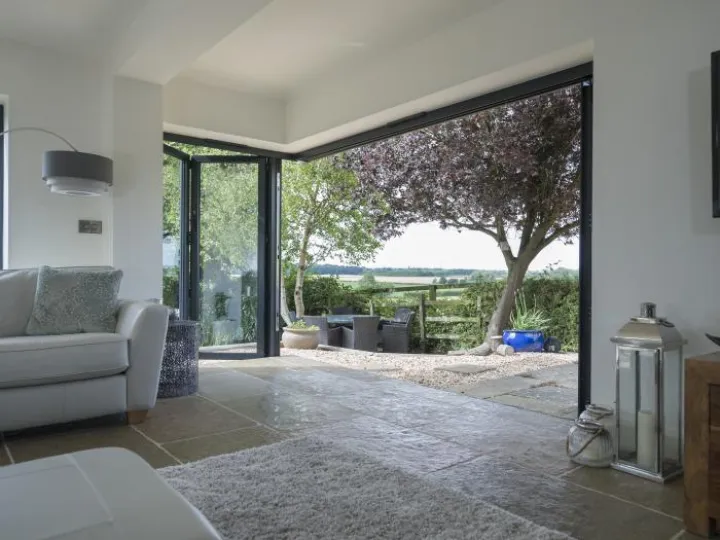 Open corner sliding door in a living room
