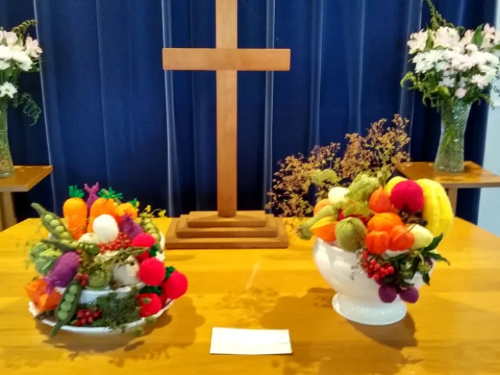 Knitted fruit and cross