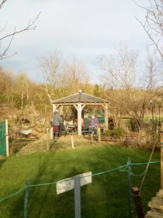 Sown walkers in Parkinsons Garden in Ardington