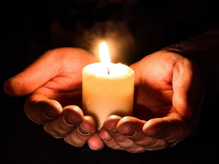 Hands, open, candle