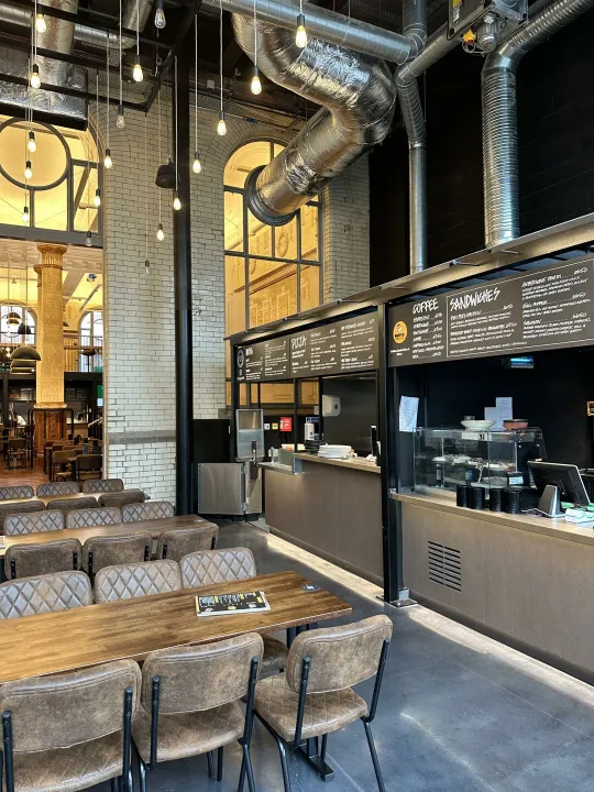 Large modern open-plan restaurant with indistrial themed fit-out