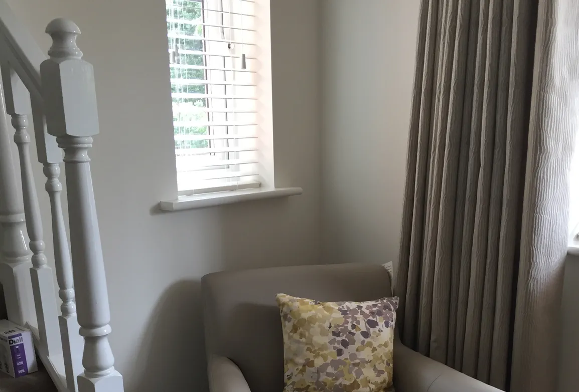 Venetian blinds in hallway