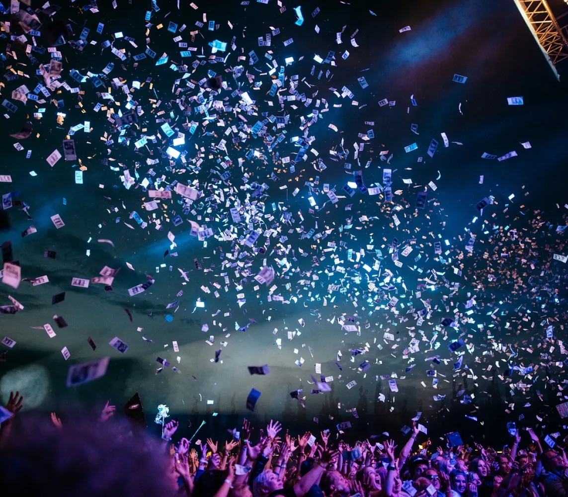 Confetti cascading down during a rock concert