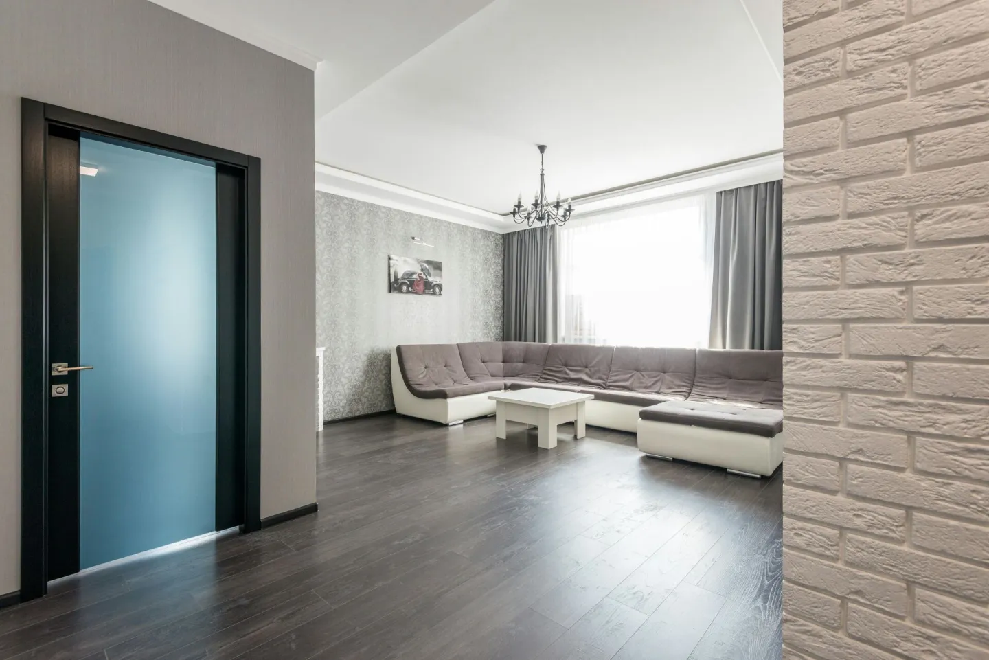 View of empty spacious living room with wooden