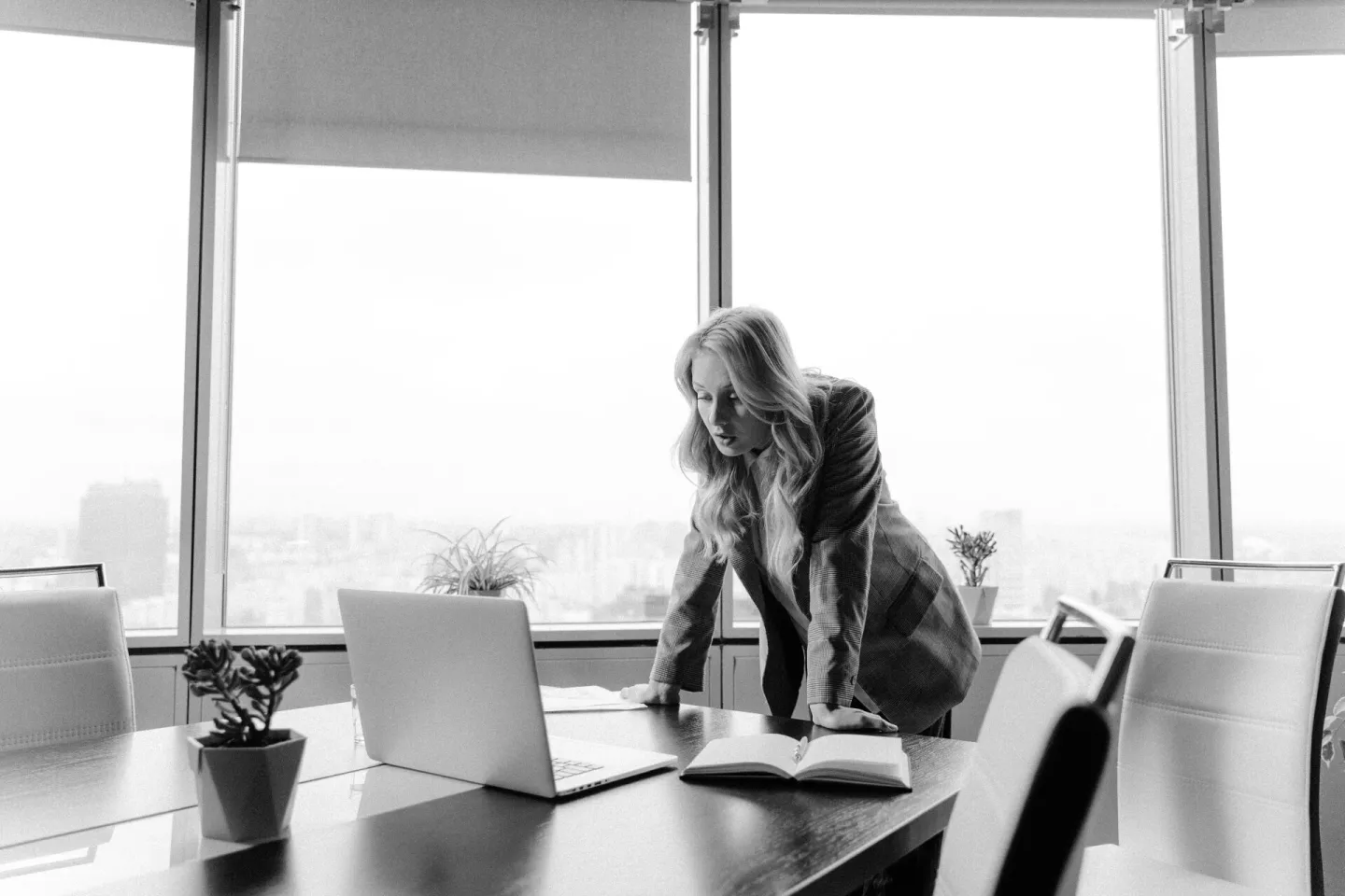 Businesswoman strategizing in a bright office
