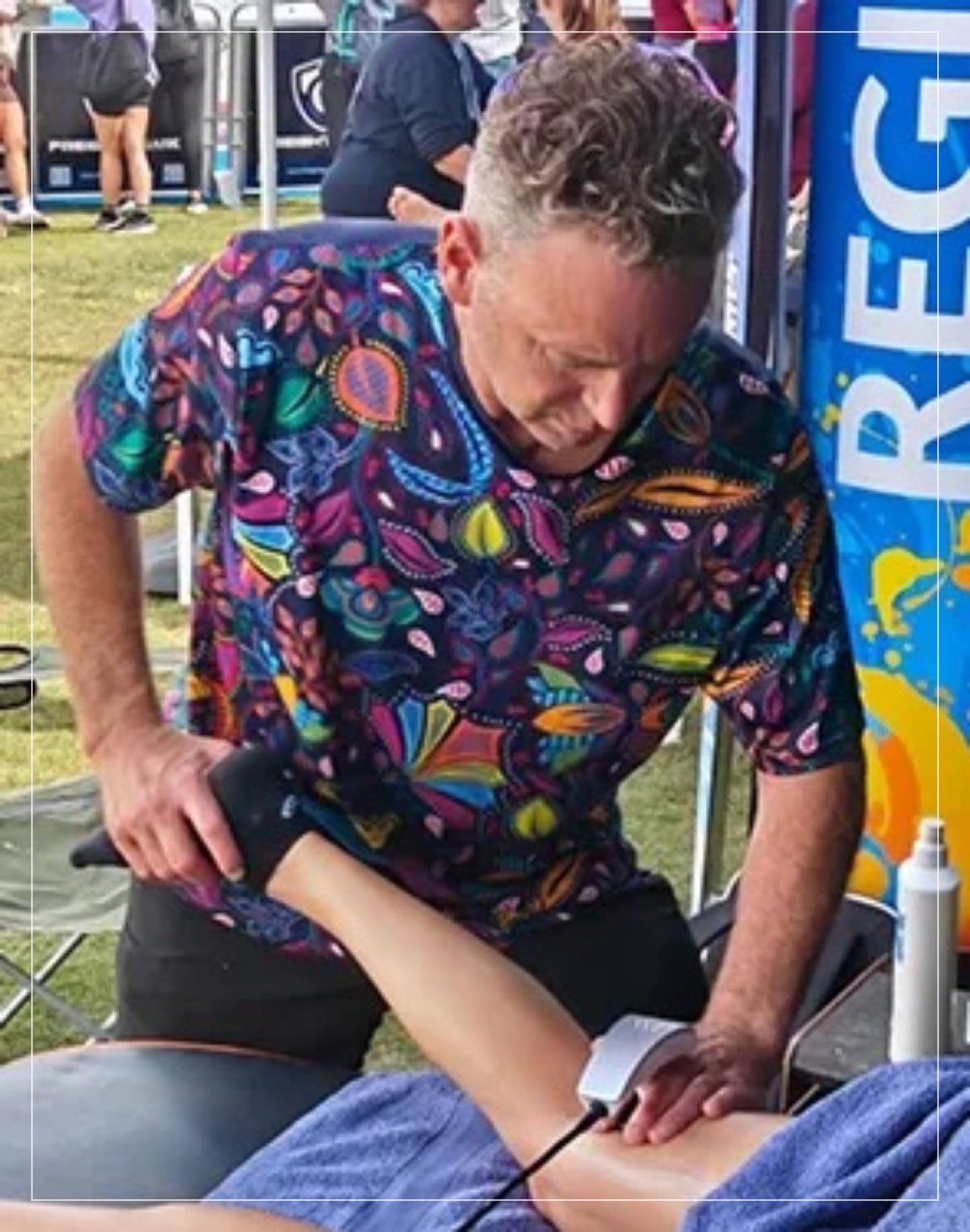 Jason providing sports treatment at an event