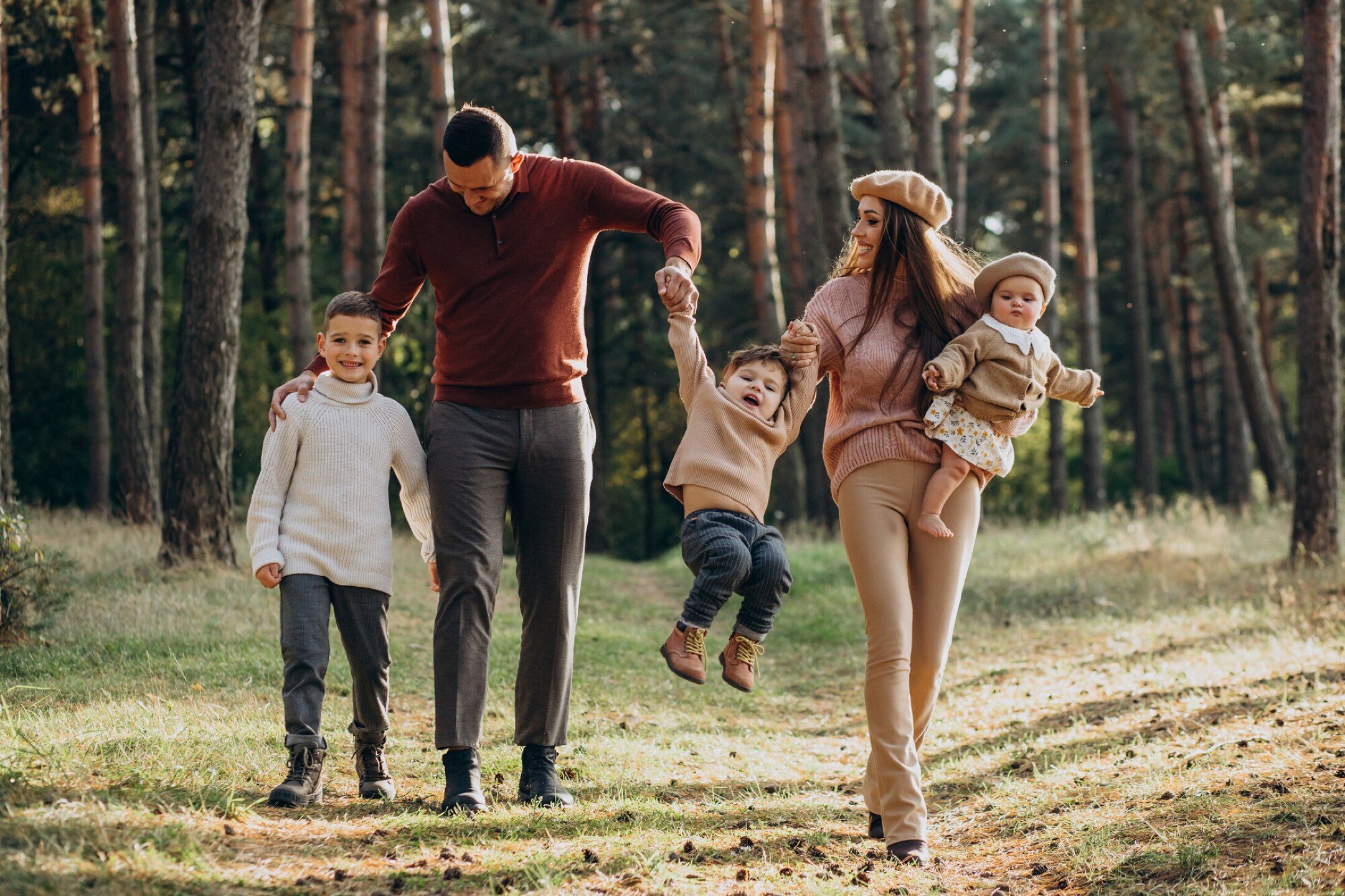Young family with children in park
