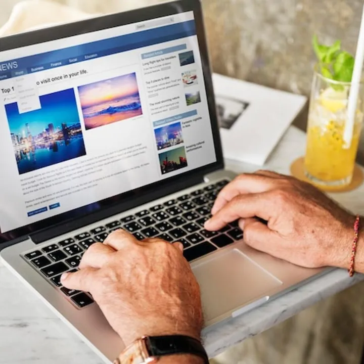 Elderly man is using computer laptop