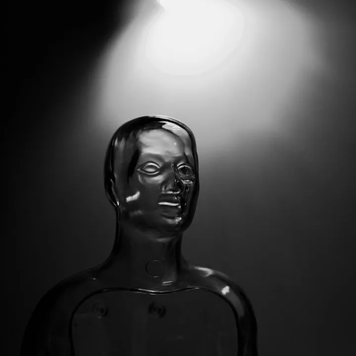 A futuristic transparent mannequin illuminated by
