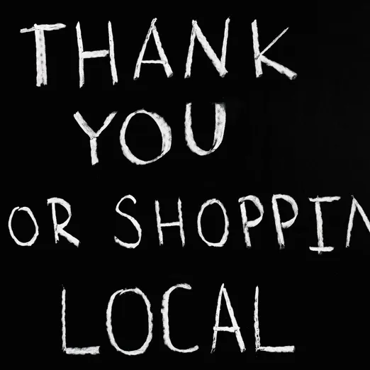A chalkboard with handwritten message thanking