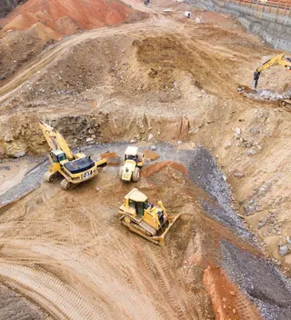 Yellow diggers on a construction site