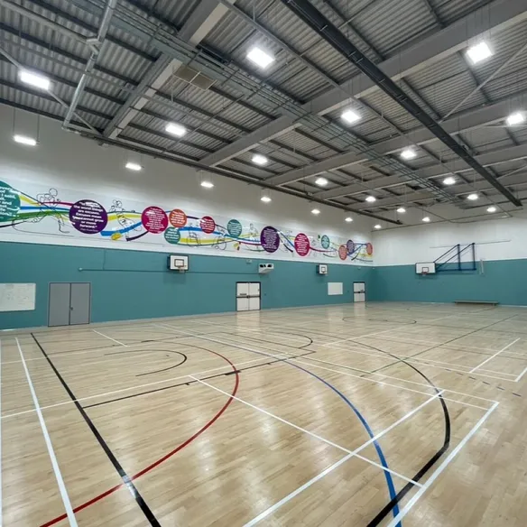 Indoor sports hall with basketball court