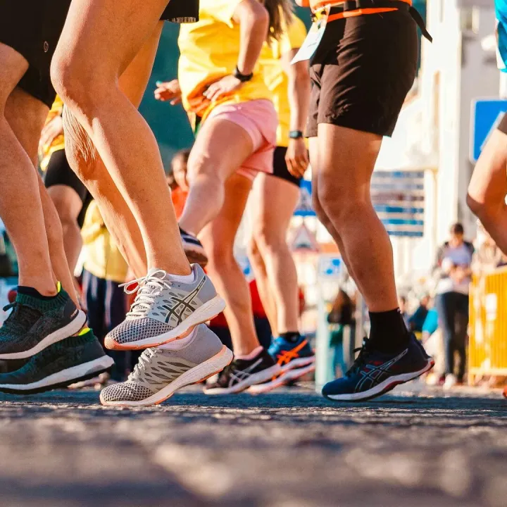 Group of runners participating in a city marathon