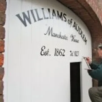Signwriting at Williams' newsagents