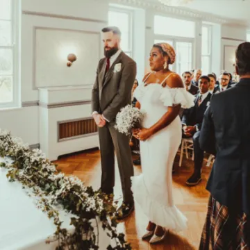 Bride at alter in pink dress