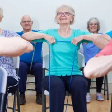 Seniors using exercise bands