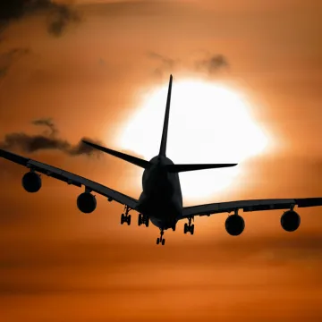 Shadow Image of a Plane Flying during Sunset