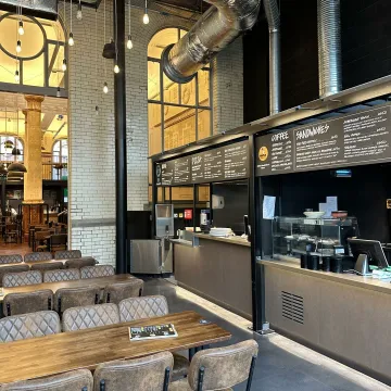 Large modern open-plan restaurant with indistrial themed fit-out