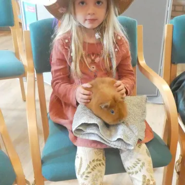 Girl and Guinea Pig