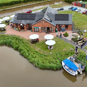 Audlem Lass offloads passengers at Overwater Marina and Cafe at Bridge 80