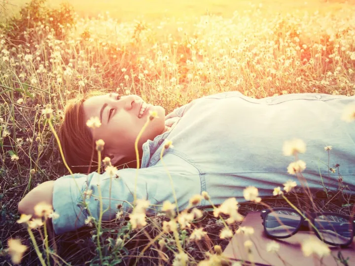 Girl lying in a field
