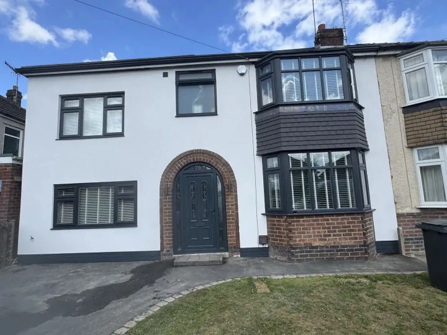 Semi-detached house after silicone rendering
