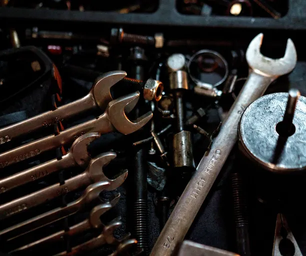 Detailed view of scattered wrenches and metal