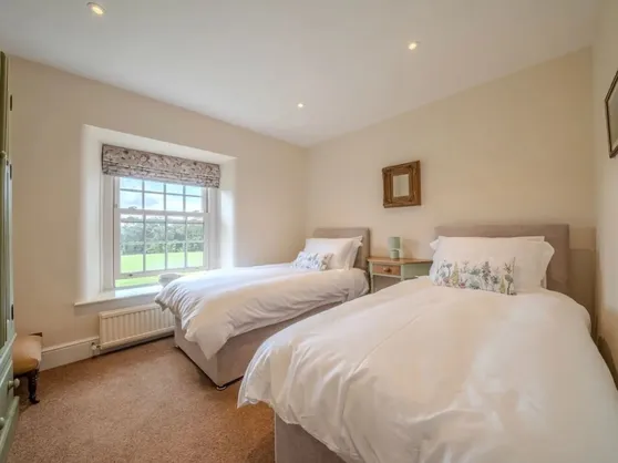 Bedroom four with two twin beds