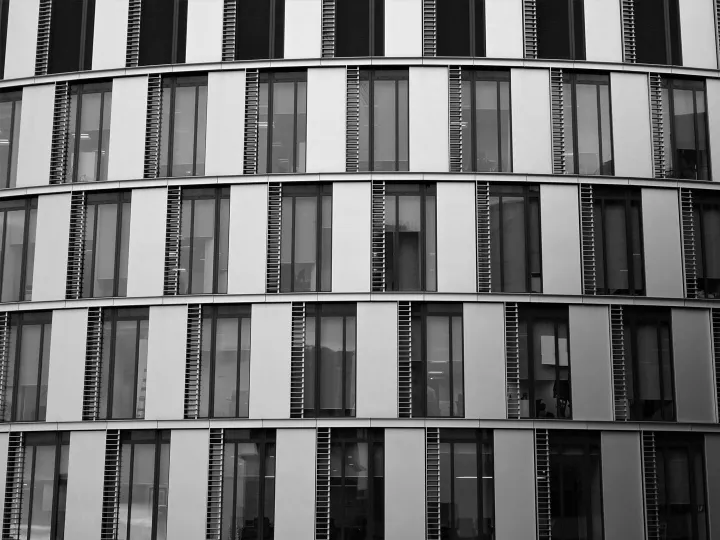 Close-up of a contemporary office building facade in glass and steel