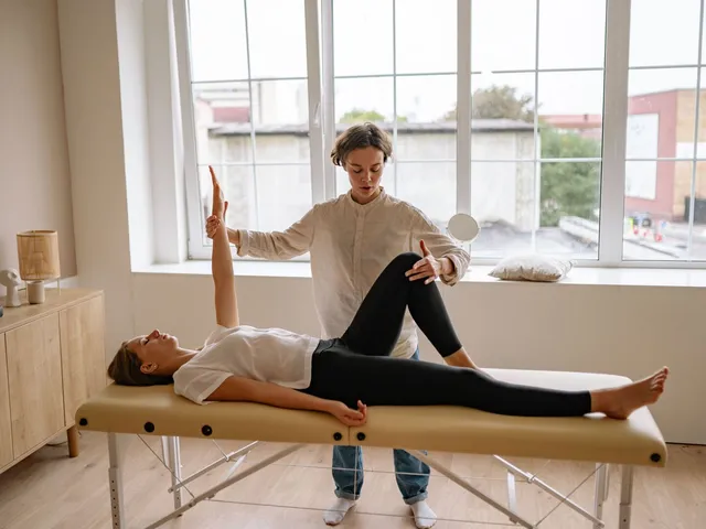 Sports rehabilitation session on a treatment couch